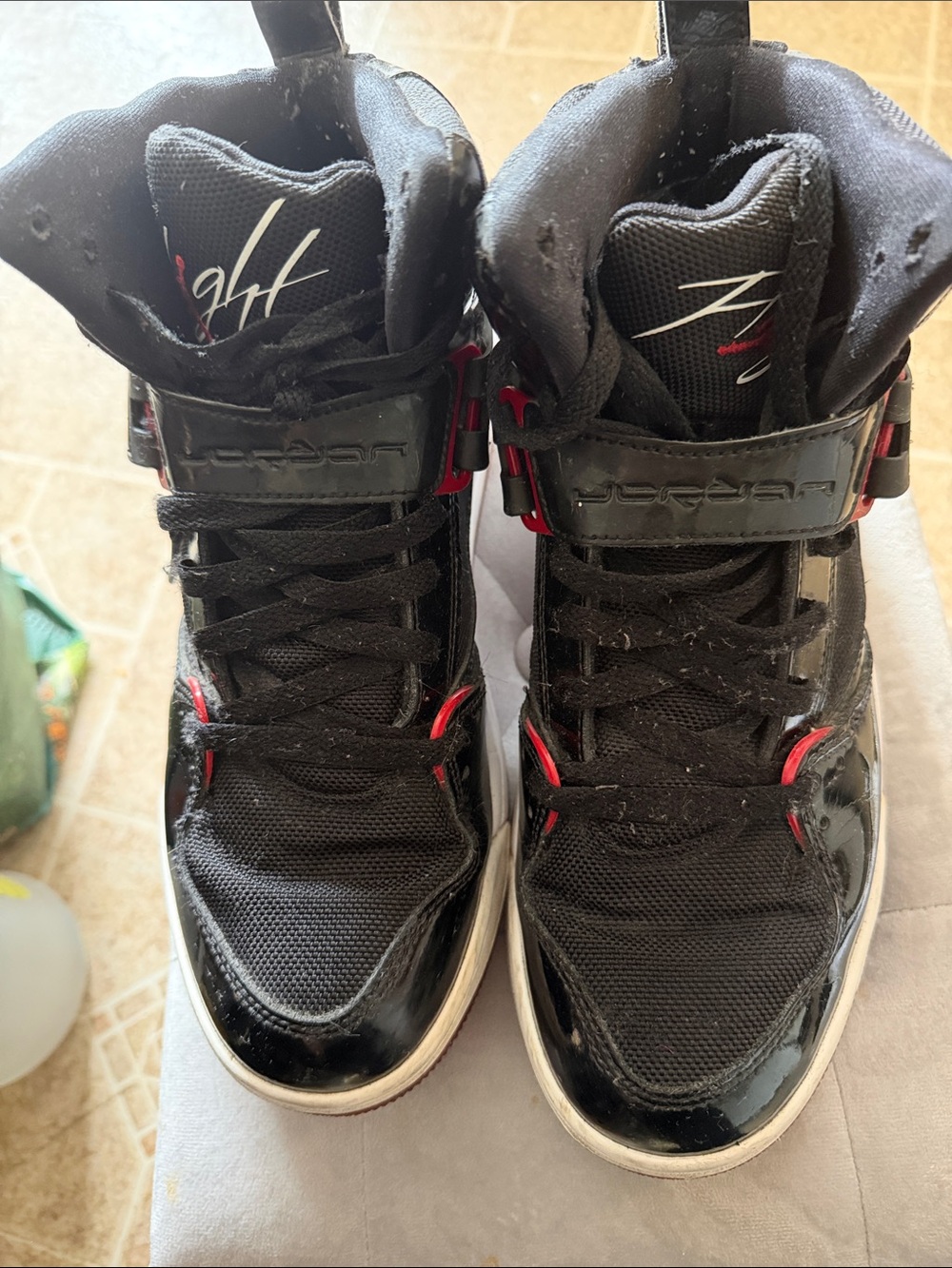Jordan Black High-Top Sneakers with Red Highlights